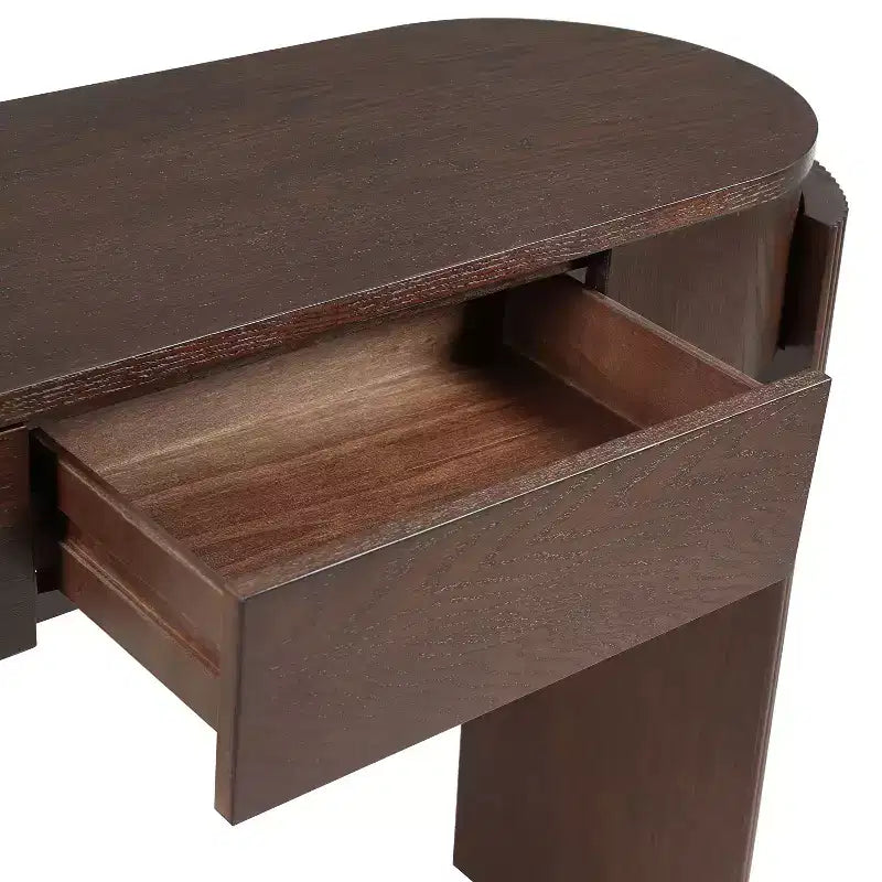 Mesa consola moderna con parte superior ovalada, patas curvas acanaladas y 2 cajones ocultos